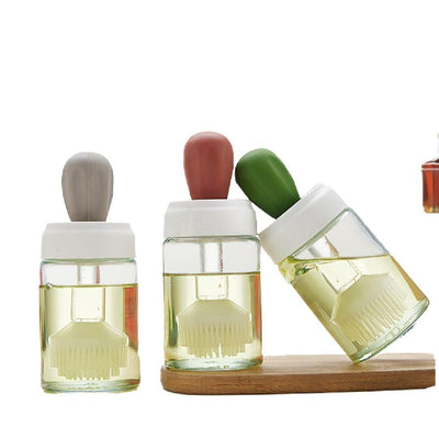 Glass Oil Dispenser Bottle with Silicone Basting Brush – Heat-Resistant Cooking Oil Sprayer (Random Color)